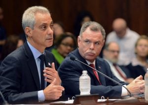 Chicago Mayor Rahm Emanuel speaks before the House-Senate Joint Criminal Reform Committee in Chicago, Tuesday, Sept. 23, 2014. Emanuel asked state legislators to make possession of less than 1 gram of any controlled substance a misdemeanor in Illinois and possession of less than 15 grams of marijuana a ticketable offense. Looking on at right is Chicago Police Superintendent Garry McCarthy. (AP Photo/Sun-Times Media, Brian Jackson) 