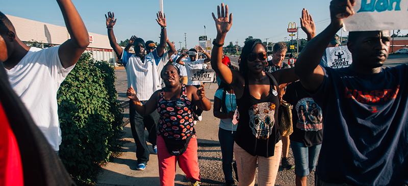 “Hands up, don’t shoot,” became a phrase synonymous with the Ferguson protests after the shooting of Michael Brown in August 2014. (Jamelle Bouie / Wikimedia Commons)