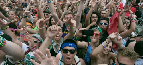 Fans dance at Spring Awakening Music Festival in 2014. Some criticize the genre’s culture and artists for proliferating sexism and objectifying women. (DePaulia File)