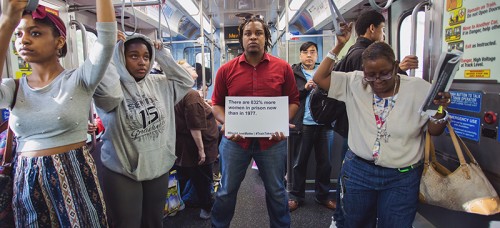 People from DePaul joined the larger Chicago community to engage in a "Train Takeover" protest on Friday, May 15, highlighting issues about African-American and civil rights. (Olivia Jepson / The DePaulia)