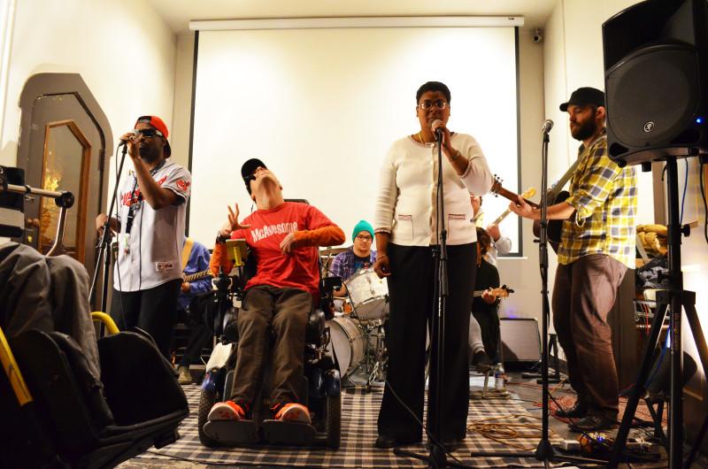 Members of the band Van Go Go perform at their album release at Comfort Station in Logan Square. Members include those with and without developmental disabilities, formed along with the Chicago arts non-profit Arts of Life. (Megan Stringer / The DePaulia) 