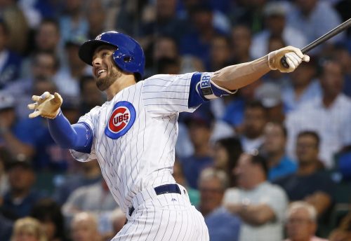 In this Aug. 31, 2016, file photo, Chicago Cubs' Kris Bryant follows through on a solo home run during the first inning of a baseball game against the Pittsburgh Pirates, in Chicago. Bryant, Bryce Harper and Big Papi are just a few of the big-name offensive stars leading their teams into the postseason. (AP Photo/Nam Y. Huh, File)
