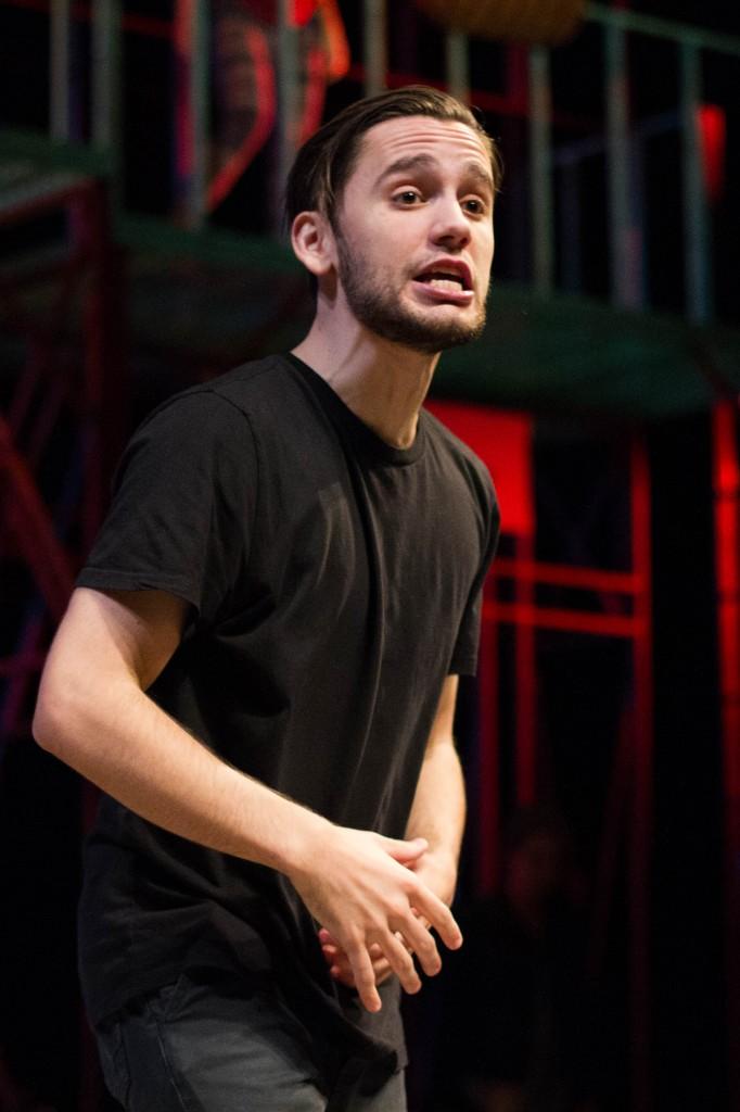 Wesley Toledo, a senior acting major  who plays Usnavi, leads the cast as the  narrorator of “In the Heights.” (Grant Myatt / The DePaulia)