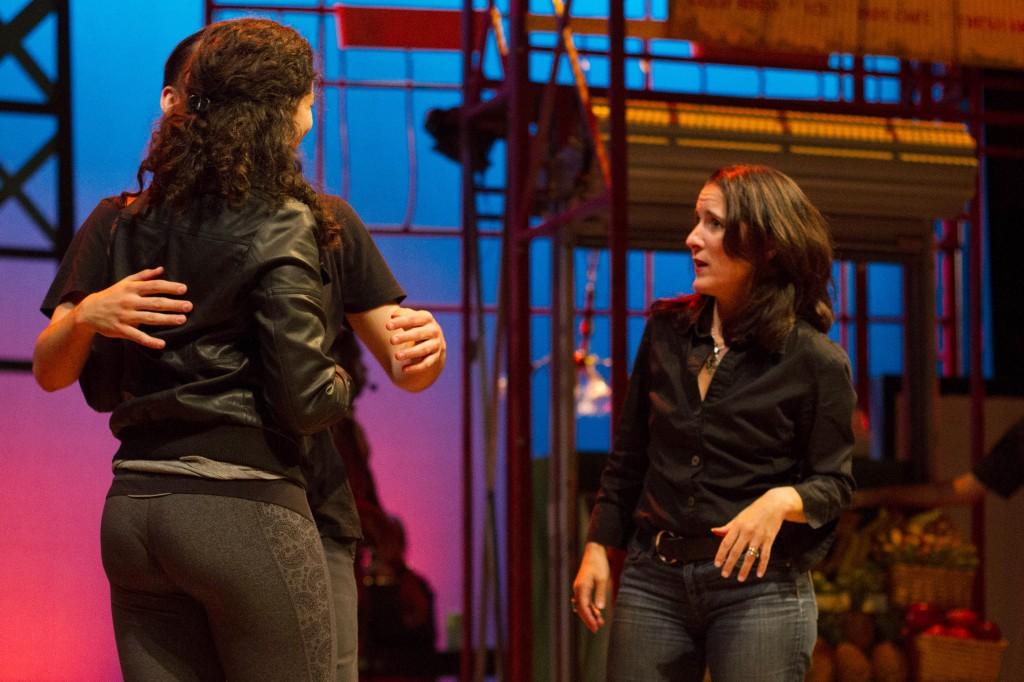 Director Lisa Portes provides direction while onstage during a tech rehearsal Sept. 19 (Grant Myatt / The DePaulia)