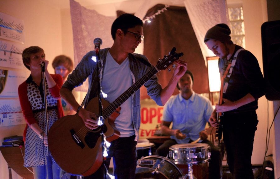 Musicians playing The Rad Pad, the name given to SAIC student Mylo Reyess apartment that doubles as a performance space for local musicians. Photo by Parker Asmann.