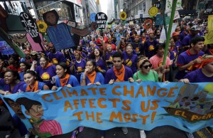  Marchers in New York City's People's Climate March, which drew hundreds of thousands of demonstrators to the city, Sept. 21. Photo courtesy Mel Evans/AP.