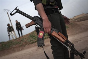 A member of a Kurdish Popular Protection Unit, which is combating the extremist militant group ISIS in northern Iraq. The United States has been supporting forces in Iraq fighting ISIS, and Congress just voted to arm many other groups in Syria to combat ISIS. Photo by Manu Brabu/AP.