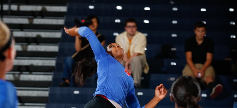Freshman Myah Reed goes up to spike the ball.  (Photo courtesy of DePaul Athletics)