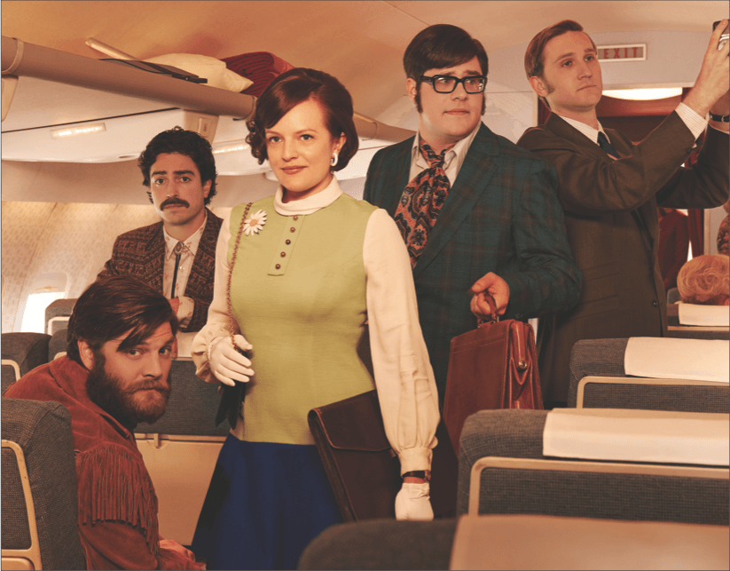 Part of the cast of AMCs Mad Men, including Elisabeth Moss (center), who plays rising advertising executive Peggy Olsen.