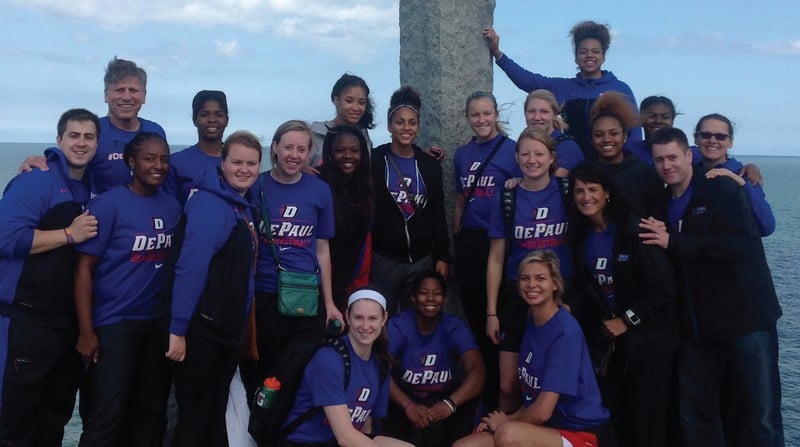The womens basketball team poses in Normandy, France. They were there Aug. 11 to Aug. 22. (Photo courtesy of DePaul Athletics)