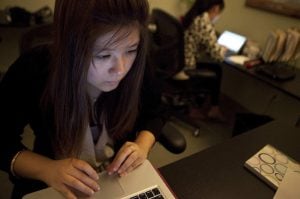 Cecilia Wu, a business intern with the Cinarron Group, Santa Monica, CA. Critics fear that employers are exploiting unpaid interns as a source of "free labor." (ARKASHA STEVENSON | MCT CAMPUS)