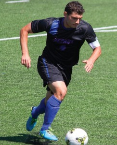 Senior Koray Yeselli goes for the ball. (Grant Myatt / The DePaulia)