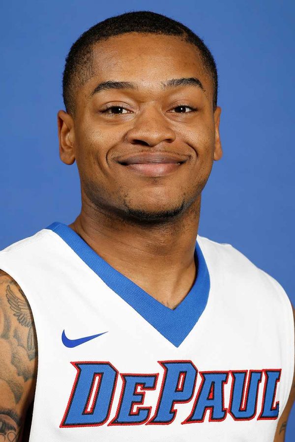 Aaron Simpson will join the DePaul depth chart as a guard this upcoming season, a position not particularly hurting for players.
The transfer junior, however, expects to be part of the team that contributes off the bench.
“I’m here to fill in, give them a couple of breathers, coming in to help the team,” he said. “But if I have an open shot, I’m going to knock it down.”
DePaul head coach Oliver Purnell recruited Simpson for his natural scoring ability. Simpson committed to DePaul in March, a day after recruit and Washington D.C. guard Jon Davis backed away from a verbal commitment by reclassfying to the class of 2015. 
“Aaron is obviously going to be a big threat for us offensively,” Purnell said. “He’s a natural scorer.” 
For the first few weeks, he’s been working with his fellow guards as he adjusts to Division I basketball.
“I’m working out with (Billy Garrett Jr.) and Durell (McDonald) since they’ve been here,” he said.  “I’m just trying to fill in with these guys to see how it is, how the Big East is, what to work on and what to look for.”
Simpson also said he already has a familarity with Garrett from his days in high shcool.
“Billy and I together is fantastic,” Simpson said. “We’ve got ball movement and are creating offense for our team. He knows my game and I know his. We’re just trying to evolve and get better every day.” 
Simpson comes from Lincoln College, a junior college in Lincoln, Illinois where he averaged 20.2 points per game in his two seasons with the Lynx. He had originally signed with Illinois State coming out of high school but did not qualify academically. He averaged 26.2 points per game in high school at North Chicago, which led the state. He finished third in the voting for Illinois’ 2012 Mr. Basketball, behind Jabari Parker and Keith Carter. 
From an in-game standpoint, Simpson looks to bring his prolific scoring ability, as well as some leadership and quickness to the team. 
“I bring scoring, passing and quickness, which is a big deal here,” he said. “I’m bringing defense too and trying to be a leader.”
Simpson also compared his game to former Connecticut standout Kemba Walker, explaining how he is “a small guy who can still fill it up.”
“I’m also here to keep the defense honest with my shooting abilities,” he said. 
But Simpson is still in the process of learning the offense. While he found his teammates in Saturday’s Black-Blue scrimmage, Purnell said that Simpson still needs to master the playbook. 
“I thought his ball movement was OK,” Purnell said. “He was doing that more off of natural ability, which is good because that’s why you recruit a guy.”
Regarding the upcoming season, Simpson said the team is preaching defense in the practices leading up to the Nov. 6 exhibition opener against Lewis.  
“We’re looking real good right now,” he said. “We have a good team, but if we can’t get stops we won’t win.” (Photo courtesy of DePaul Athletics)