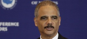 U.S. Attorney General Eric Holder speaks to a meeting of the U.S. Conference of Mayors at the Clinton Presidential Library in Little Rock, Ark., Wednesday, Oct. 8, 2014. (AP Photo/Danny Johnston)