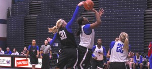 DePaul forward Megan Podkowa blocks forward Brandi Harvey-Carr on a layup attempt. (Maggie Gallagher / The DePaulia)