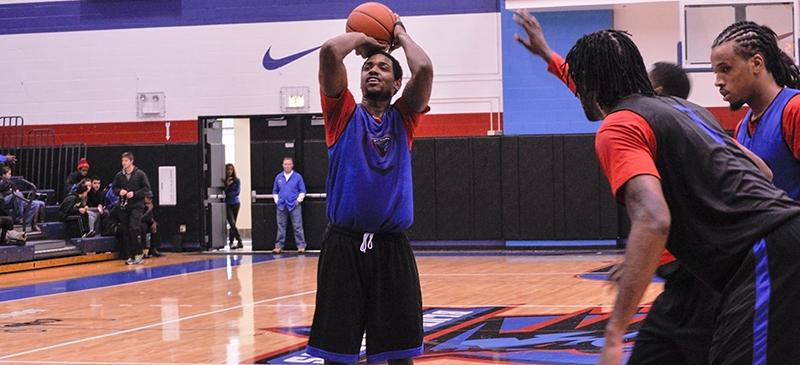 DePaul forward Myke Henry shoots a free throw at Saturday’s scrimmage between the men’s basketball team at McGrath-Phillips Arena. (Maggie Gallagher / The DePaulia)