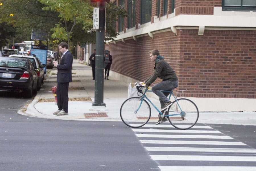 FILE-A biker riding down Fullerton Avenue. Many students use biking as a way to get around campus. Photo by Carlyn Duff/The DePaulia