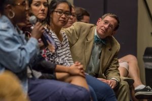 Gerald Koocher, Dean of DePaul’s College of Science and Health looks as a student asks Emily Graslie a question about her work as Chief Curiosity Correspondent for the Field Museum. (Julian Hayda / The DePaulia)