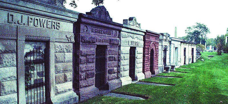 Mausoleums line the way at Graceland Cemetery, located in Chicagos Uptown neighborhood. The cemetery is home to many ghost stories. (Giovanna Lenski / The DePaulia)