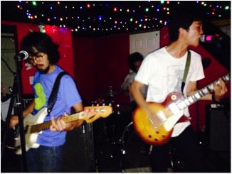 Japanese group Your Pest Band performs at a DIY space in Chicago. The band says the underground music scene in the United States is much more active than it is in Japan. (Photo courtesy of Benny Hernandez)