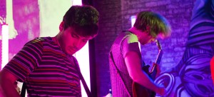 Anamanaguchi plays Emporium Beercade. Left: Attendees play pinball before the show. (Kirsten Onsgard / The DePaulia)