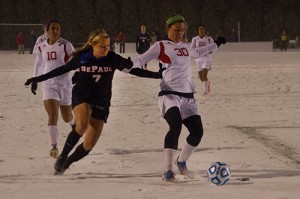 Junior Elise Wyatt fights for the ball. (Grant Myatt / The DePaulia)