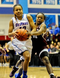 DePaul guard Brittany Hrynko (12) drives against Texas A&M's Shlonte Allen (10) during the first half of an NCAA women's college basketball game at the McGrath-Phillips Arena in Chicago, Friday, Nov. 14, 2014. (AP Photo/Matt Marton)