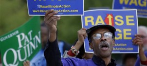 A referenda question that asked Illinoisans if the minimum wage should be raised passed with more than two-thirds support. (Seth Perlman | AP)
