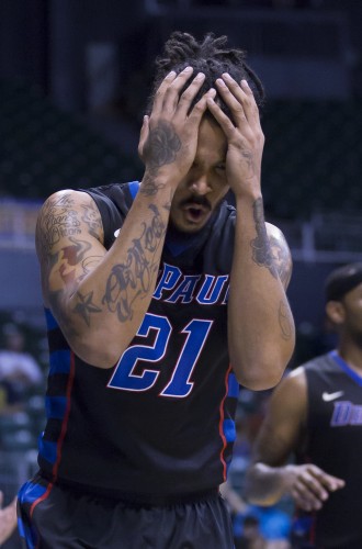 DePaul forward Jamee Crockett (21) holds his head in his hands reacting to a foul called on him in the first half of an NCAA college basketball game at the Diamond Head Classic on Monday, Dec. 22, 2014, in Honolulu. (AP Photo/Eugene Tanner)