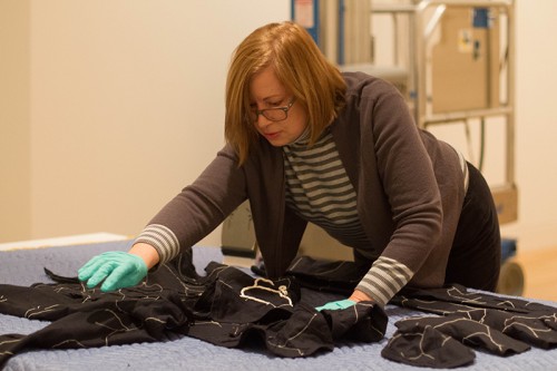 Interim director Laura Fatemi, who began her position at the beginning of the year, prepares a piece for “Rooted in Soil.”  (Grant Myatt / The DePaulia)