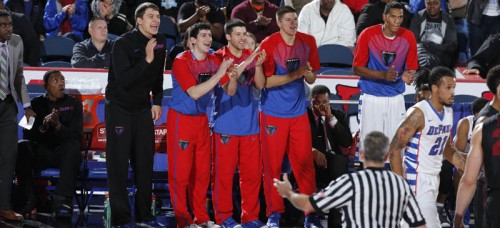 From left to right: Peter Ryckbosch, Cory Dolins, David Molinari and Joe Hanel make up the self-proclaimed Bench Mob providing support and enthusiasm to their team. (Photo courtesy of DePaul Athletics)