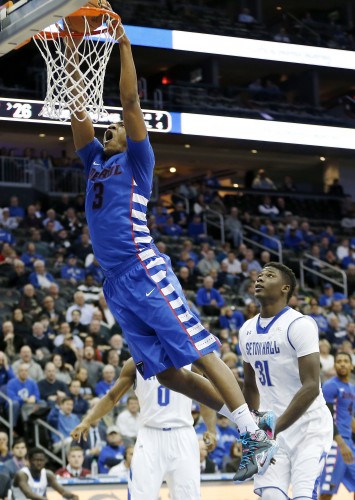 DePaul forward Rashaun Stimage dunks against Seton Hall during the first half of an NCAA college basketball game, Thursday, Jan. 22, 2015, in Newark, N.J. (AP Photo/Julio Cortez)