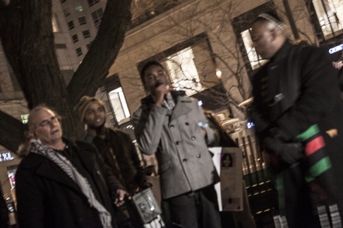 DePaul junior Elijah Obasanya speaks at the demonstration. (Kevin Gross / The DePaulia)