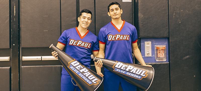 DePaul freshmen Henry Prado (left) and Irvin Bello (right) joined DePaul’s cheerleading squad. (Josh Leff / The DePaulia)