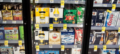 Cases of beer stacked in a cooler at Walgreen’s. Some DePaul students use fake IDs to purchase alcohol or go to bars. (Maggie Gallagher / The DePaulia)