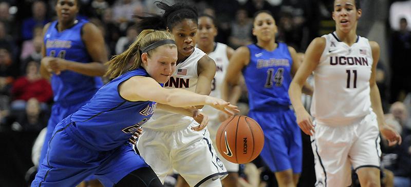 Megan Rogowski battles for a lose ball during a game against UConn on Dec. 19. (John Woike / Tribune News Service)