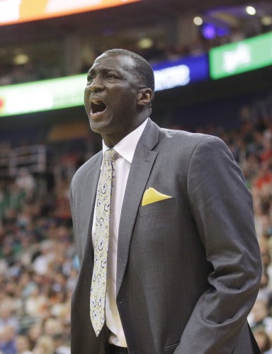 Sacramento Kings head coach Tyrone Corbin shouts in the fourth quarter during an NBA basketball game against the Utah Jazz Saturday, Feb. 7, 2015, in Salt Lake City. The Jazz won 102-90. (AP Photo/Rick Bowmer)