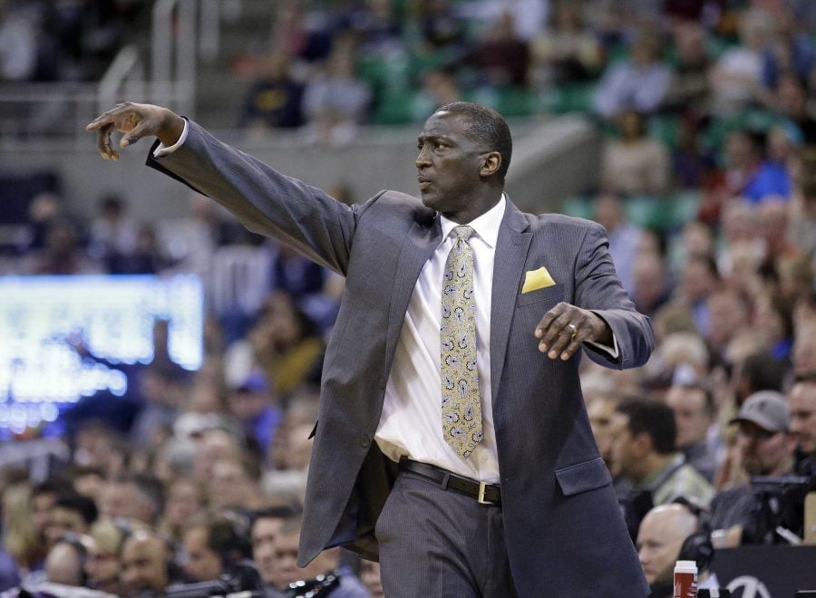 Sacramento Kings head coach Tyrone Corbin directs his team in the second quarter during an NBA basketball game against the Utah Jazz Saturday, Feb. 7, 2015, in Salt Lake City. (AP Photo/Rick Bowmer)