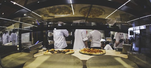 Whole Foods Market employees learn how to make the Neopolitan pizzas a week before the store opens. The store features several grab-and-go options on the first floor. (Josh Leff / The DePaulia)