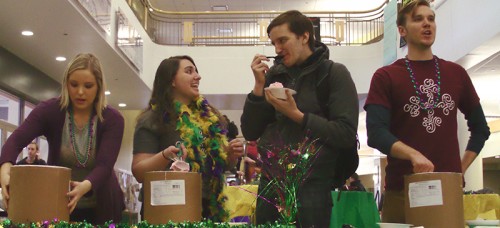 Senior Michael Hoppenrath (second from right) splurged on ice cream with the Catholic Student Union to celebrate Fat Tuesday, or Mardi Gras, the day before the beginning of Lent. (Megan Deppen / The DePaulia)