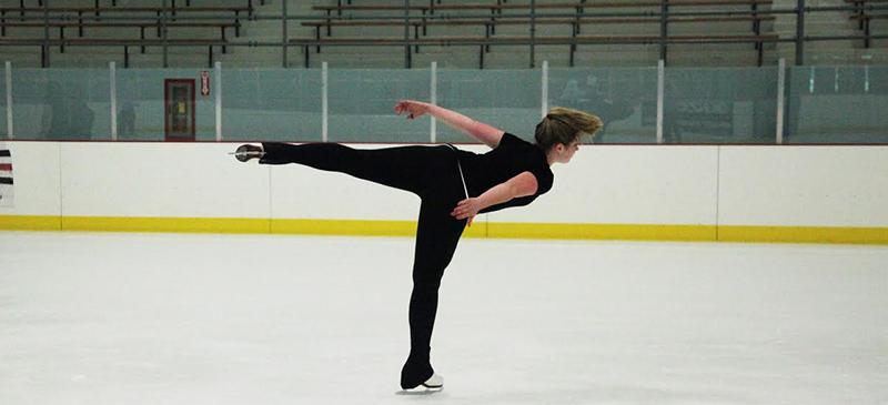 A member of the DePaul Figure Skating Club does a camel spin, a figure skating technique, at McFetridge Sports Center. (Photo courtesy of DePaul Figure Skating Club)
