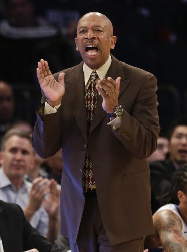 DePaul head coach Oliver Purnell calls out to his team during the first half of an NCAA college basketball game against Creighton in the first round of the Big East Conference tournament, Wednesday, March 11, 2015, in New York. (AP Photo/Frank Franklin II)