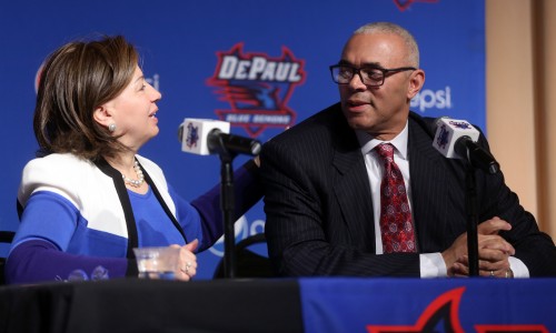 DePaul University's athletic director Jean Lenti Ponsetto introduces Dave Leitao during a news conference to announced him as their new basketball head coach Monday, March 30, 2015, at the DePaul Student Center in Chicago. Leitao is charged with a big task as he tries to revitalize a struggling program and get it back at least to the level when he led the Blue Demons from 2002 to 2005. (AP Photo/Chicago Tribune, Brian Cassella) MANDATORY CREDIT CHICAGO TRIBUNE; CHICAGO SUN-TIMES OUT; DAILY HERALD OUT; NORTHWEST HERALD OUT; THE HERALD-NEWS OUT; DAILY CHRONICLE OUT; THE TIMES OF NORTHWEST INDIANA OUT; TV OUT; MAGS OUT; NO SALES