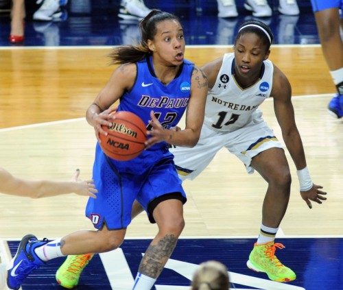 DePaul guard Brittany Hrynko (12) drives the lane as Notre Dame guard Lindsay Allen (15) defends in the first half of a women's college basketball game in the second round of the NCAA tournament in South Bend, Ind., Sunday, March 22, 2015.  (AP Photo/Joe Raymond)