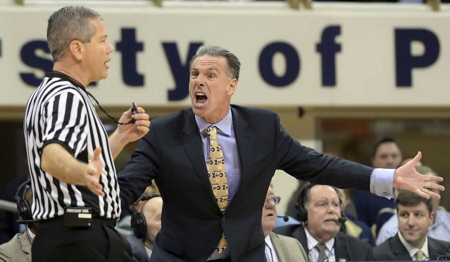 Pitt head coach Jamie Dixon argues for a shot clock violation against Georgia Tech to referee Tim Nestor in the second half at the Petersen Events Center in Pittsburgh on Saturday, Jan. 17, 2015. Pitt won, 70-65. (Matt Freed/Pittsburgh Post-Gazette/TNS)