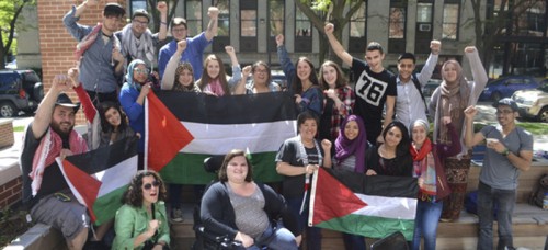 DePaul Divest organizers and supporters celebrate the success of their referendum on May 23, 2014. (Photo courtesy of Students for Justice in Palestine)
