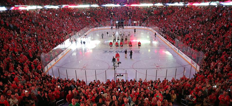 Fans cheer during the national anthem as the Chicago Blackhawks play host to the Boston Bruins in Game 2 of the NHL’s Stanley Cup Finals at the United Center in Chicago on June 15, 2013. (Brian Cassella/Chicago Tribune/MCT)
