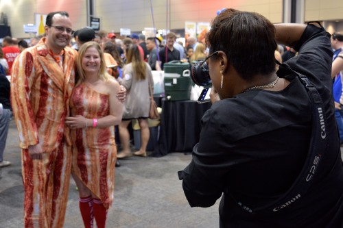 Costume contest winners Brian and Kelly McAdow pose for a picture for food blogger Donna Binbek (Katheryn Eardley / The DePaulia)