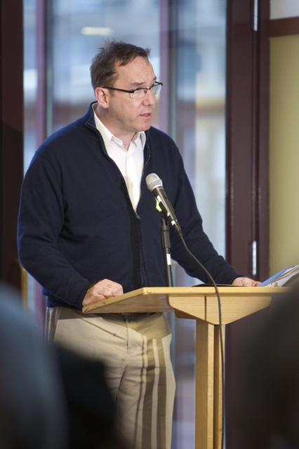 Tom Judge, Chaplain for the College of Computing and Digital Media and the Law School, delivers the invocation at the 2014 DePaul Veteran’s Luncheon.justice and poverty.  (Photo courtesy of University Ministry)