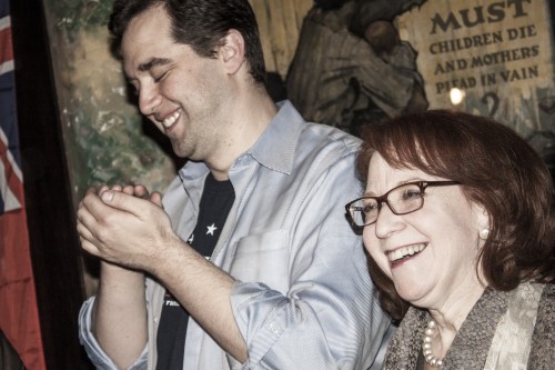 Alderman Michele Smith (right) laughs while delivering a victory speech, which was delivered despite inconclusive vote results